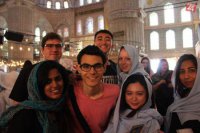 Vlastík na fotke zo stáže vľavo hore.