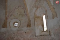 Okrúhle okno - rekonštrukcia výplne bola realizovaná na základe archeologických nálezov